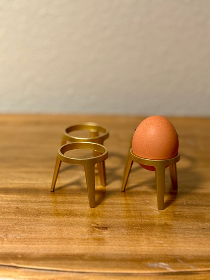 Vier goldene Eierbecher von Sebastian Frank – stilvoll & edel